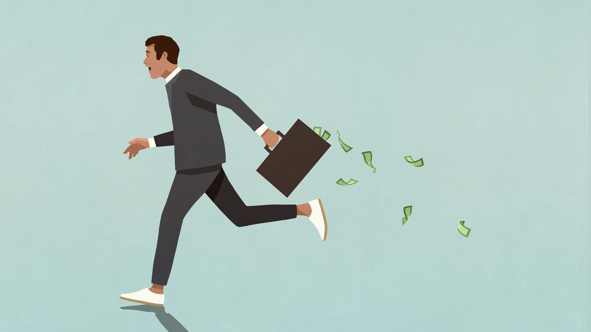 Man running away with suitcase full of money