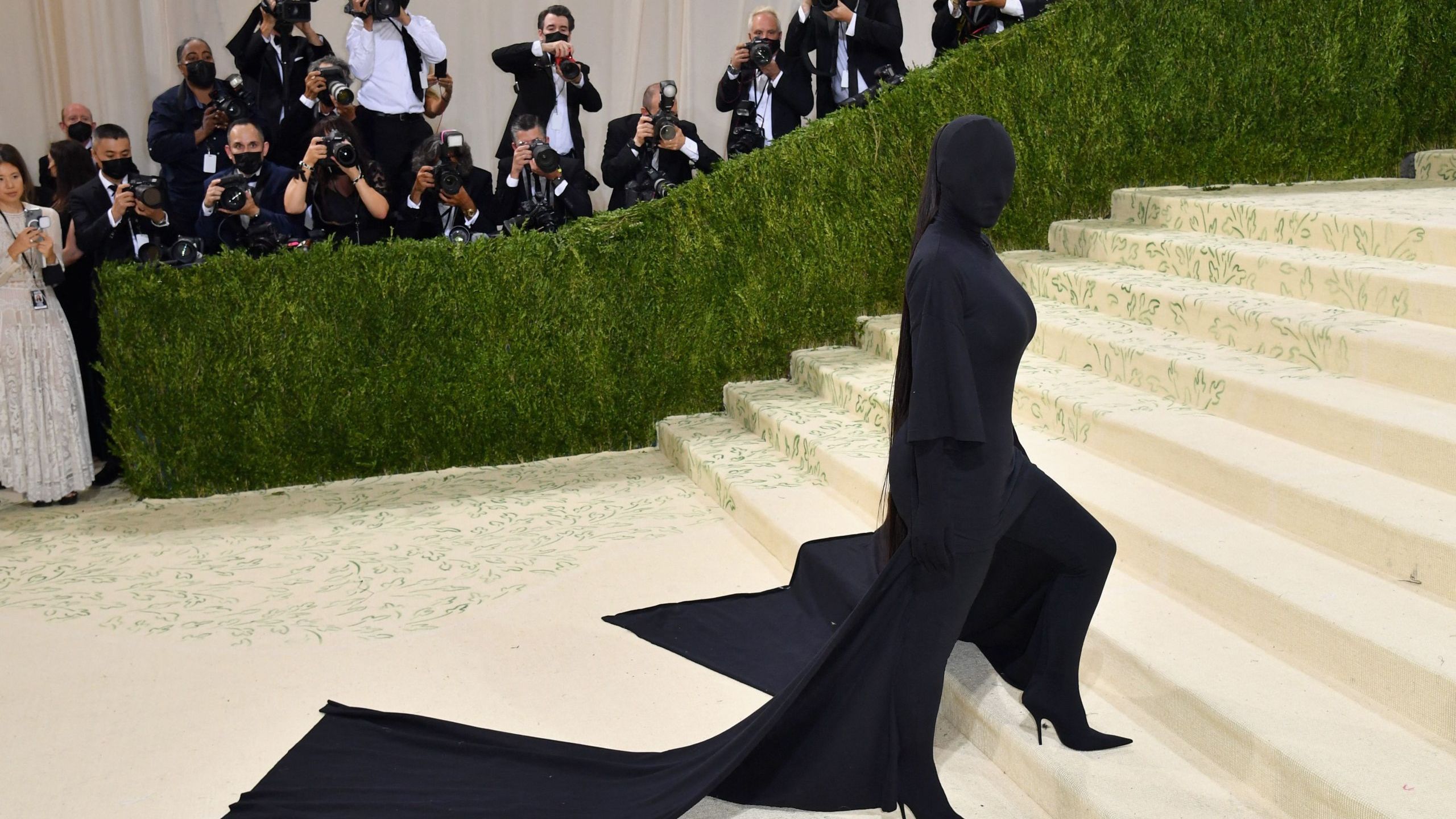 who designed kim kardashian's met gala dress Kim Kardashian Dons Sleek, Dark Set for Met Gala 2025