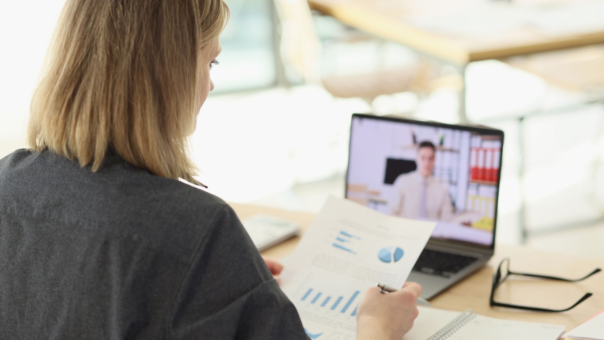 A woman is talking to her financial adviser