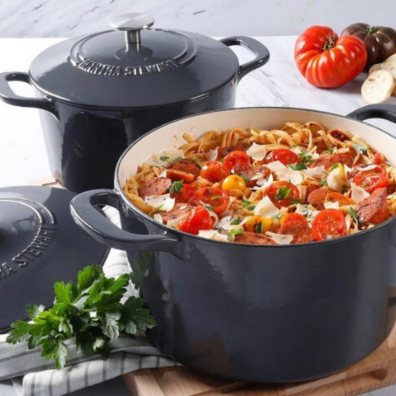Martha Stewart 7 Quart Enameled Cast Iron Dutch Oven in black filled with a one-pot pasta recipe
