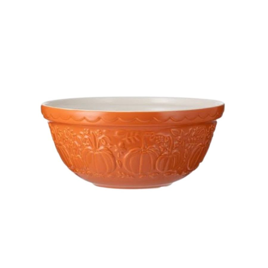 An orange Mason Cash pumpkin motif mixing bowl