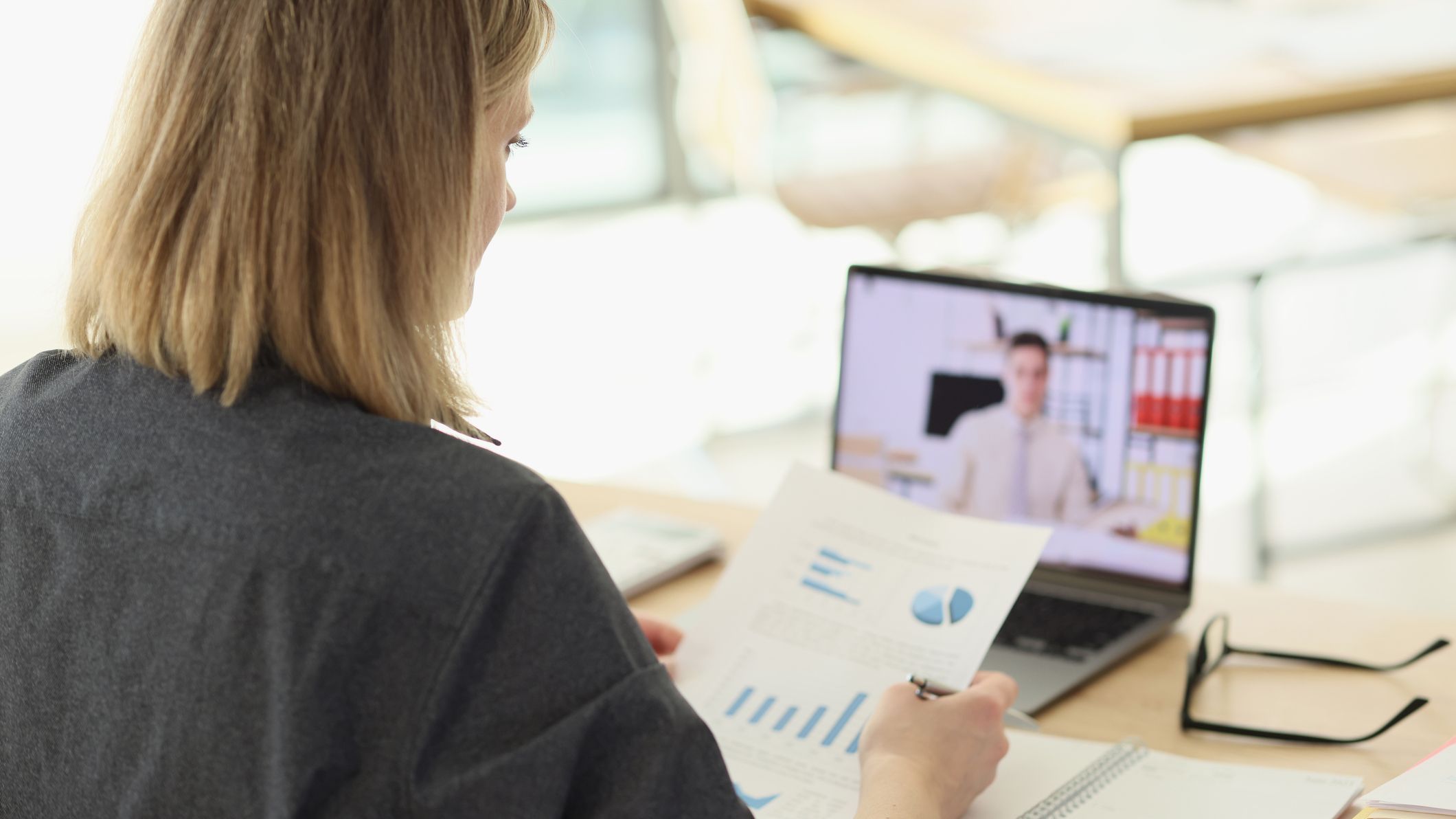 A woman is talking to her financial adviser