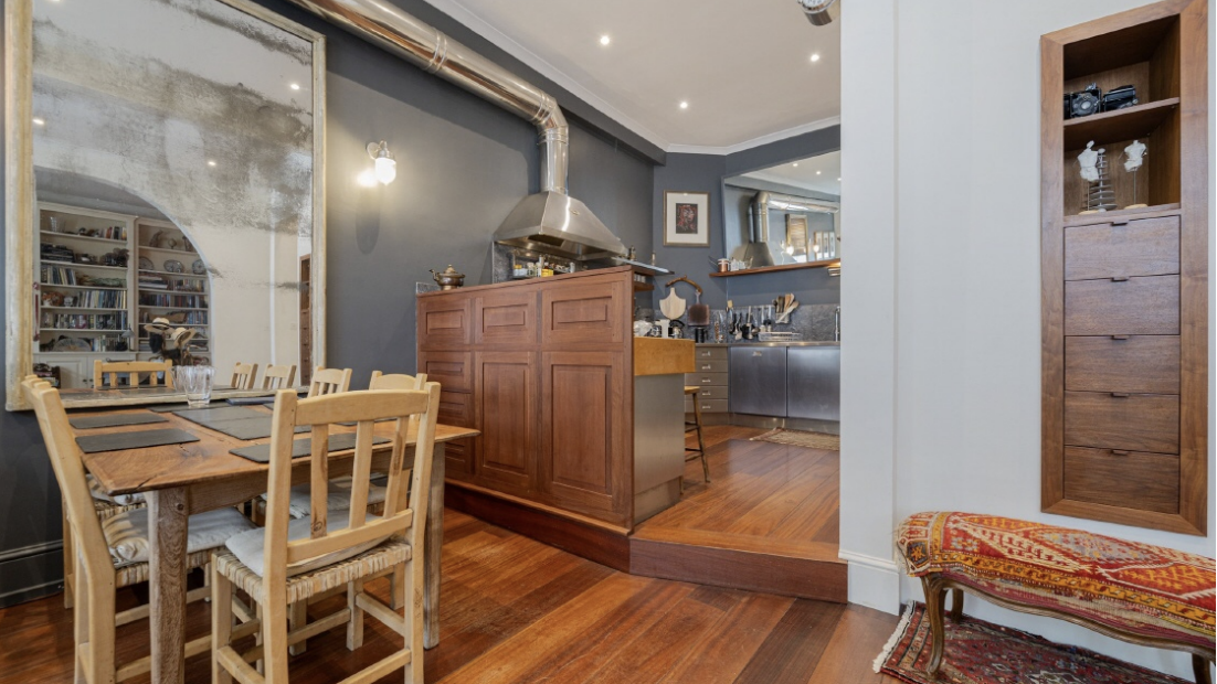 an image of the view to the kitchen from the living / dining area inside the property