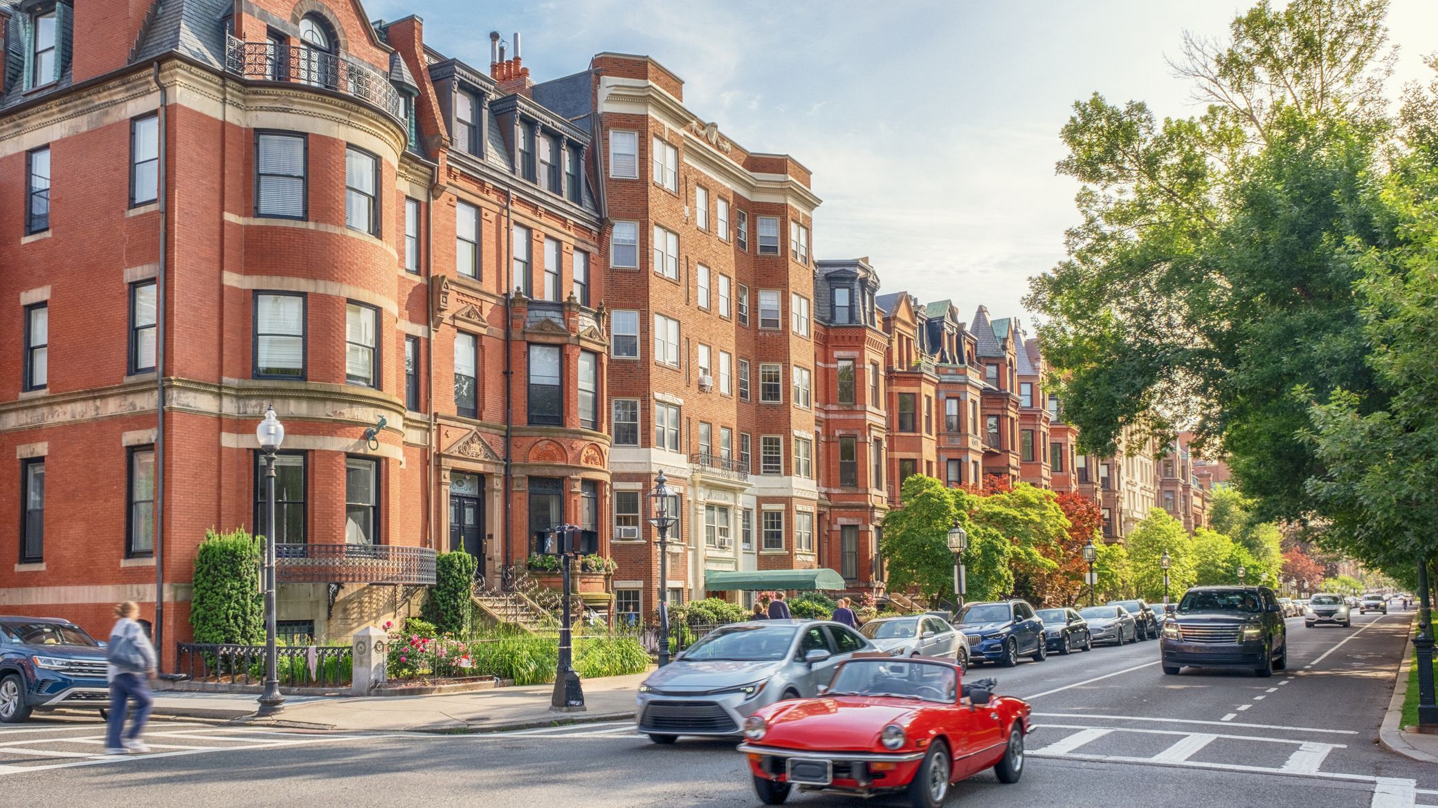 cars move along Boston's scenic skyline