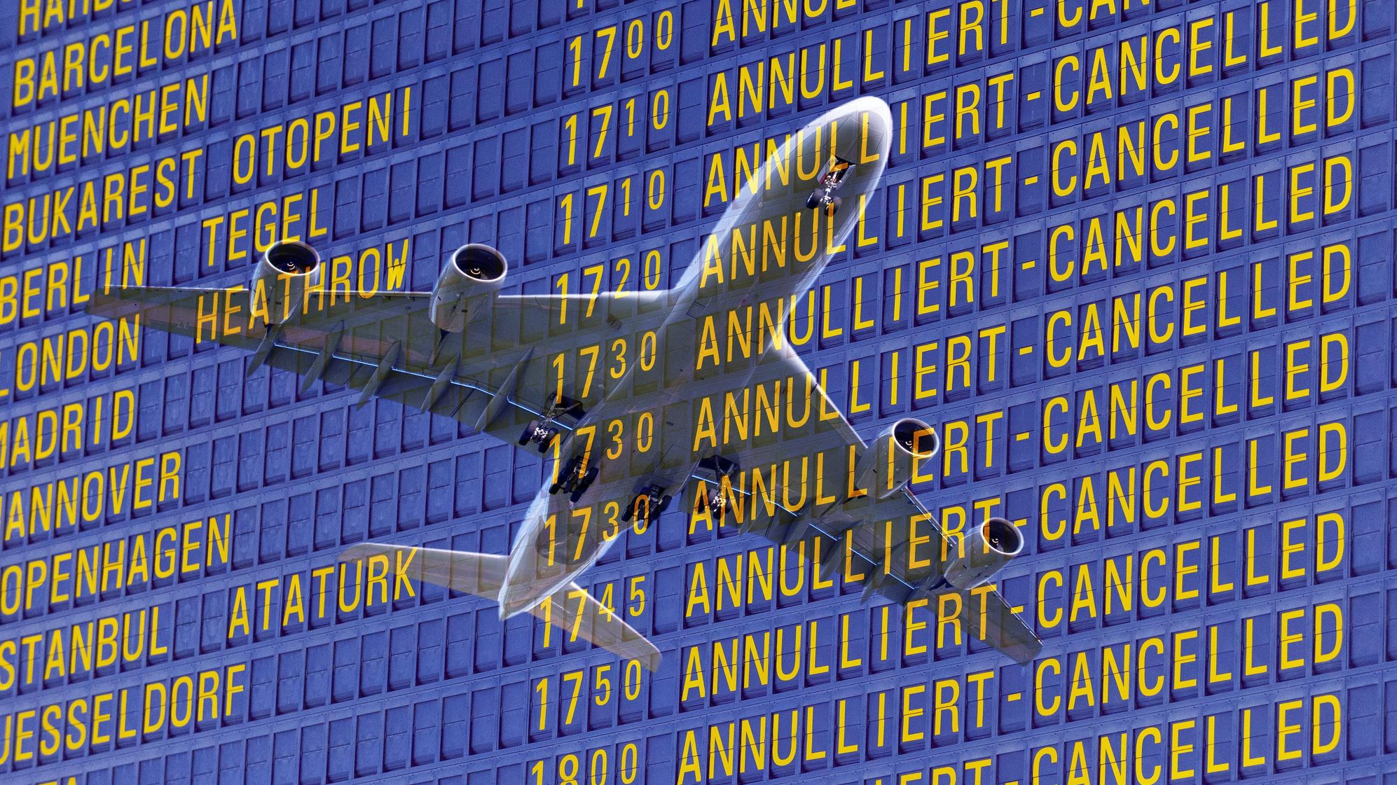 a board showing flight cancellations