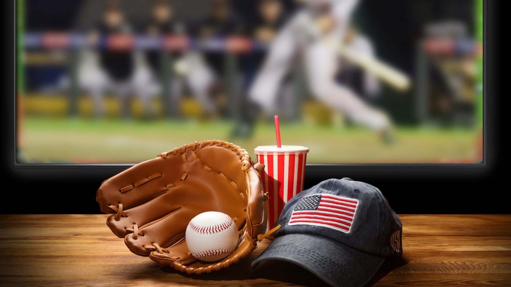 Baseball equipment on the table.