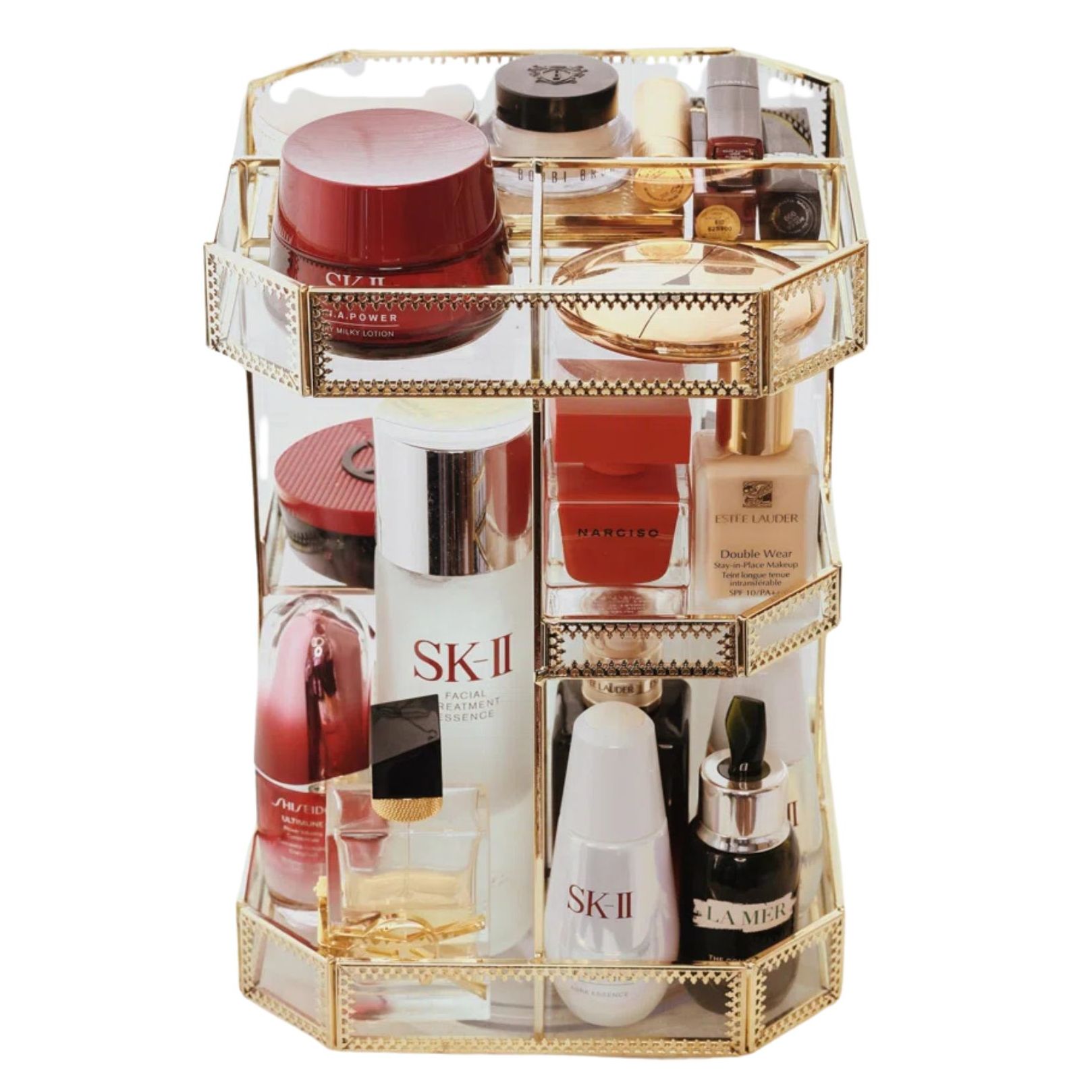 Rotating makeup organizer in gold with clear sides and embelished edges