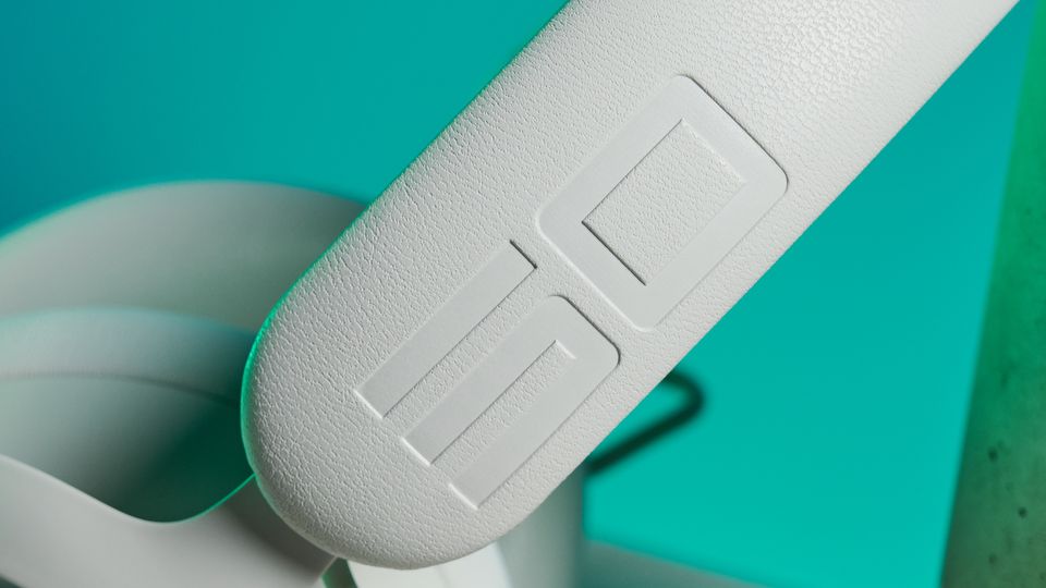 A lunar light white Alienware Pro Wireless Gaming Headset