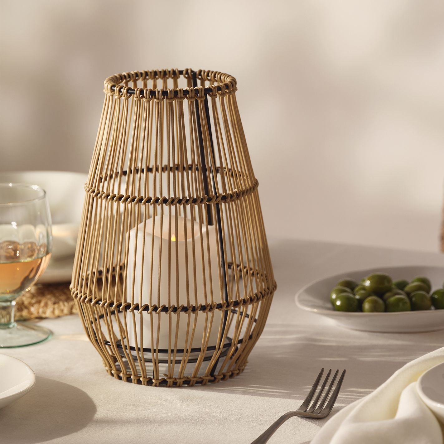iron wicker frame outdoor dinner table lantern lamp
