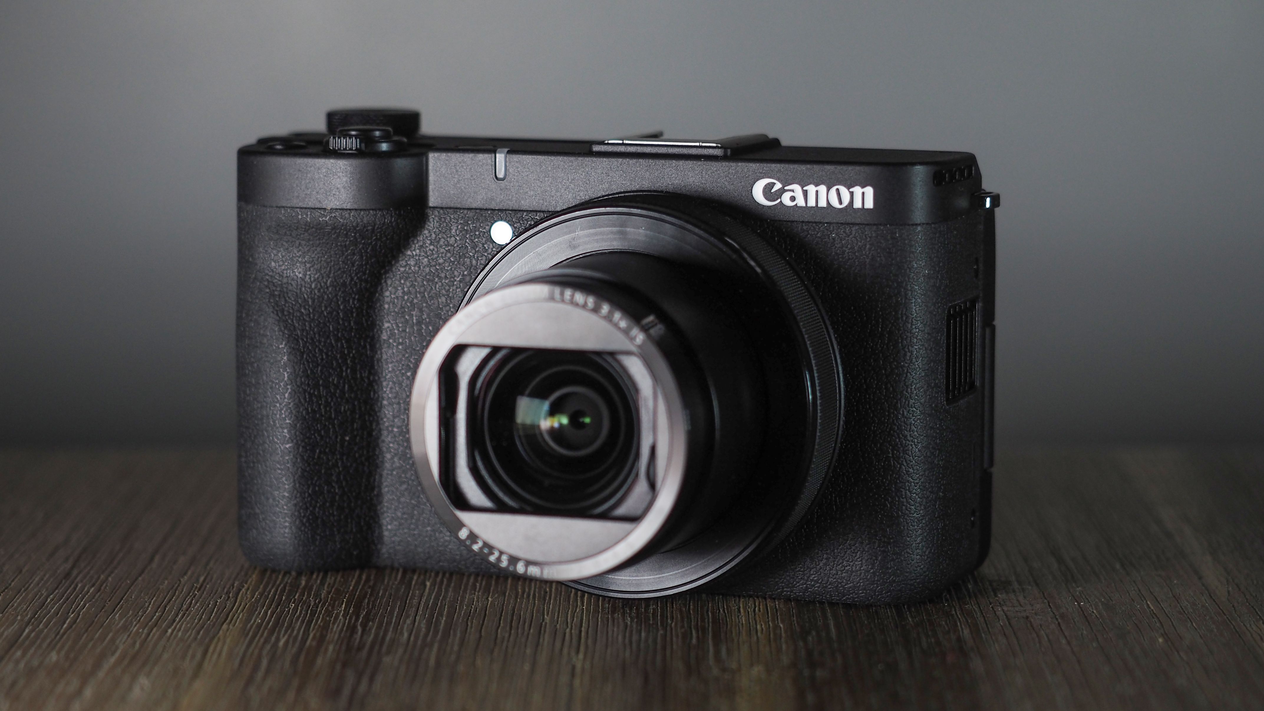 Canon PowerShot V1 on a wooden surface