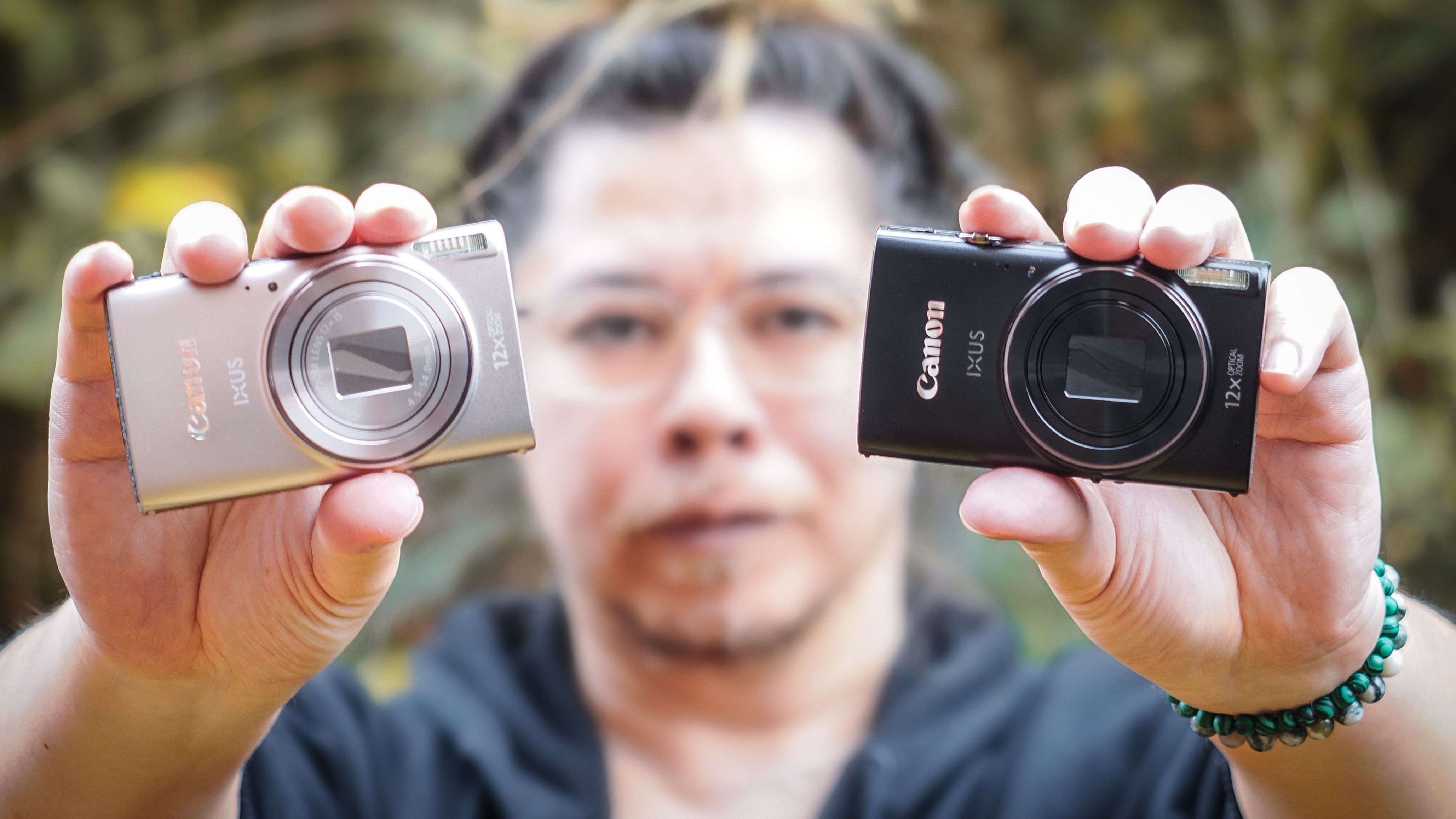 Canon PowerShot Elph 360 HS A / Canon Ixus 285 HS A being held by photographer James Artaius