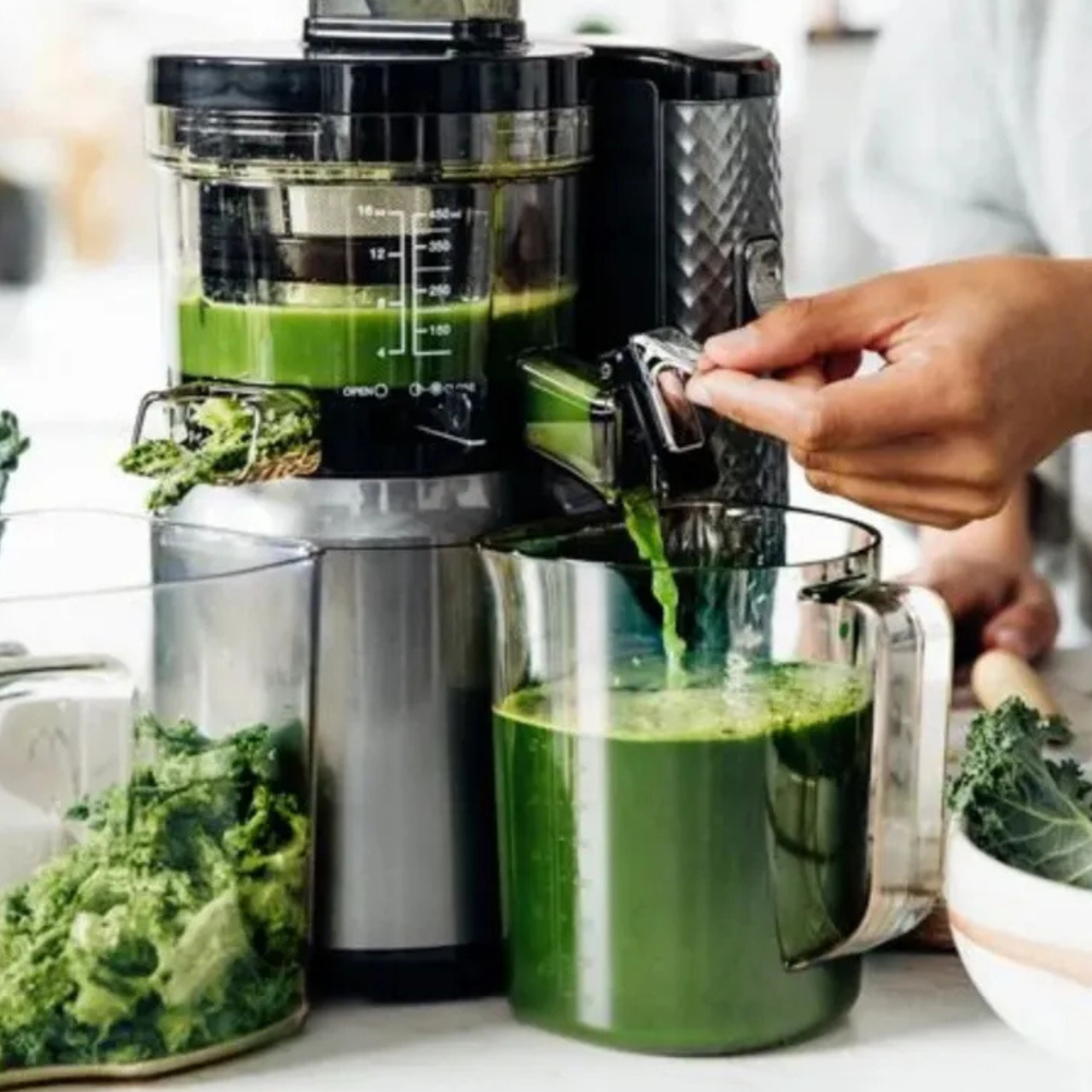 The Nama J1 making green juice