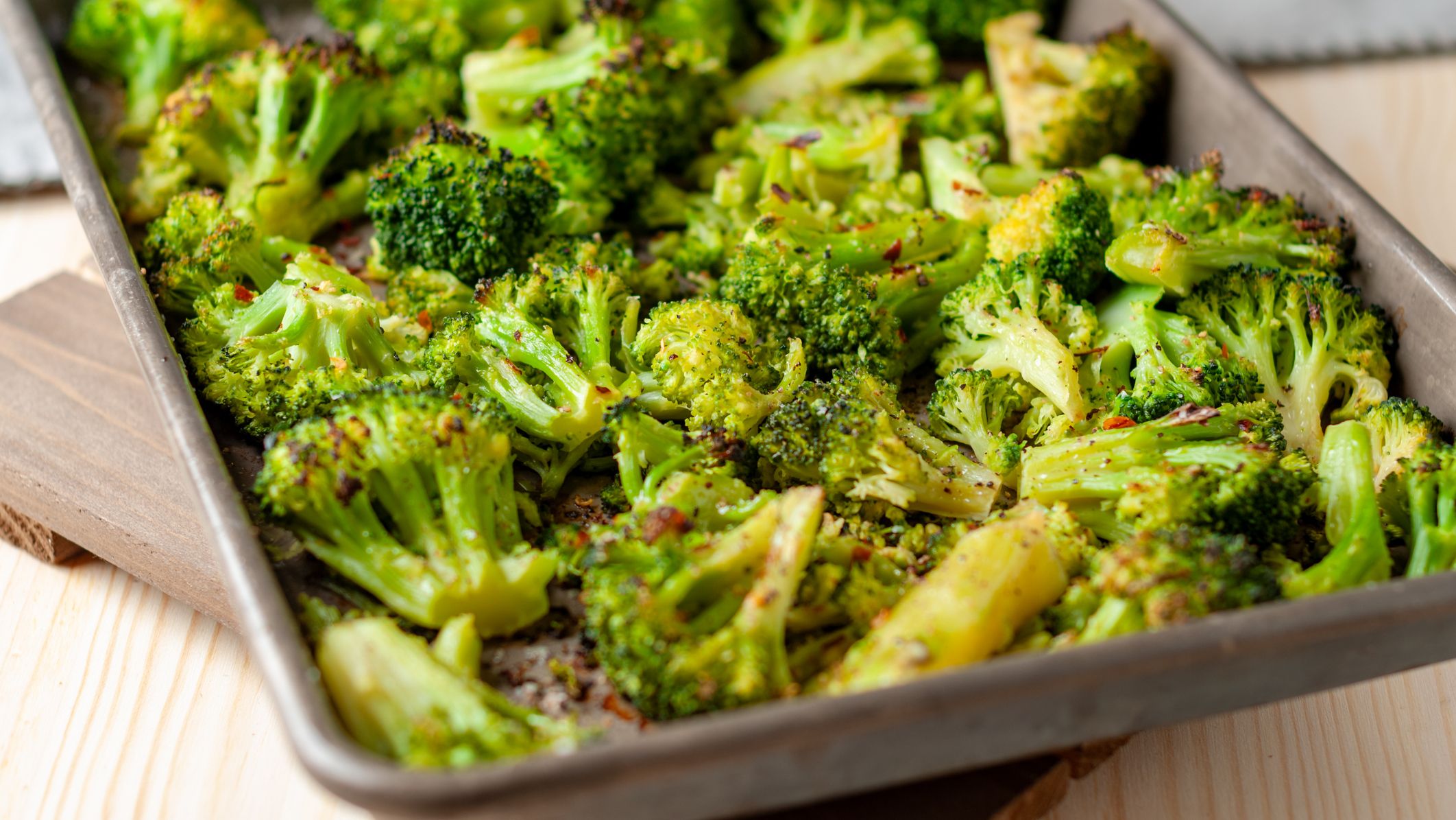 Broccoli in a sheet pan with chilli flakes