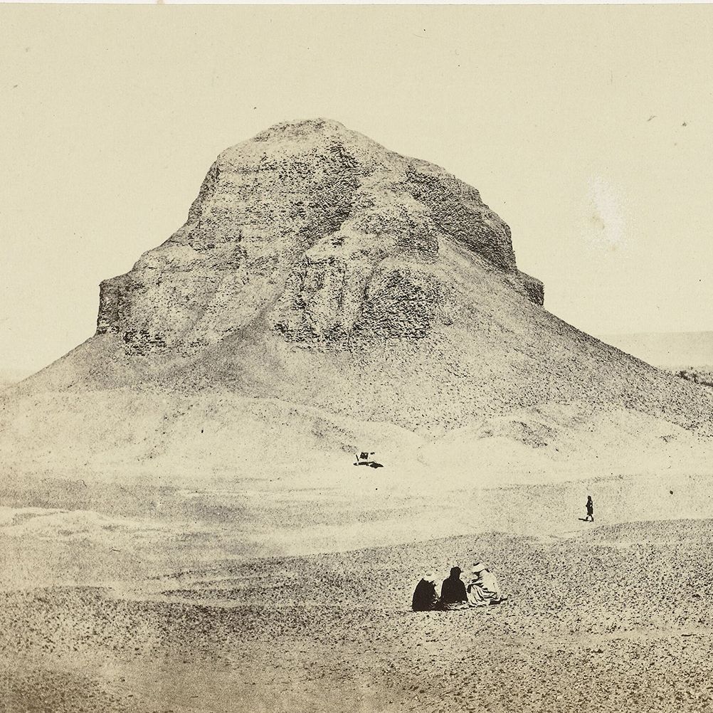 An older photograph if a dirt hill