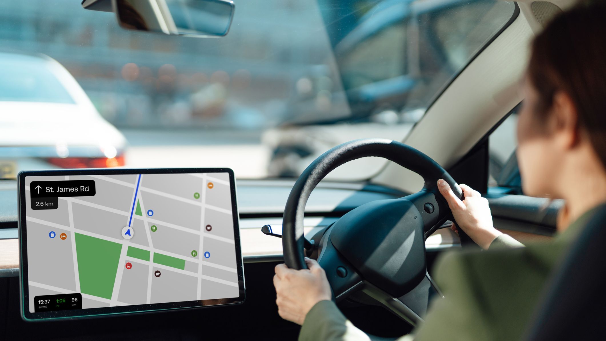 a woman driving her EV