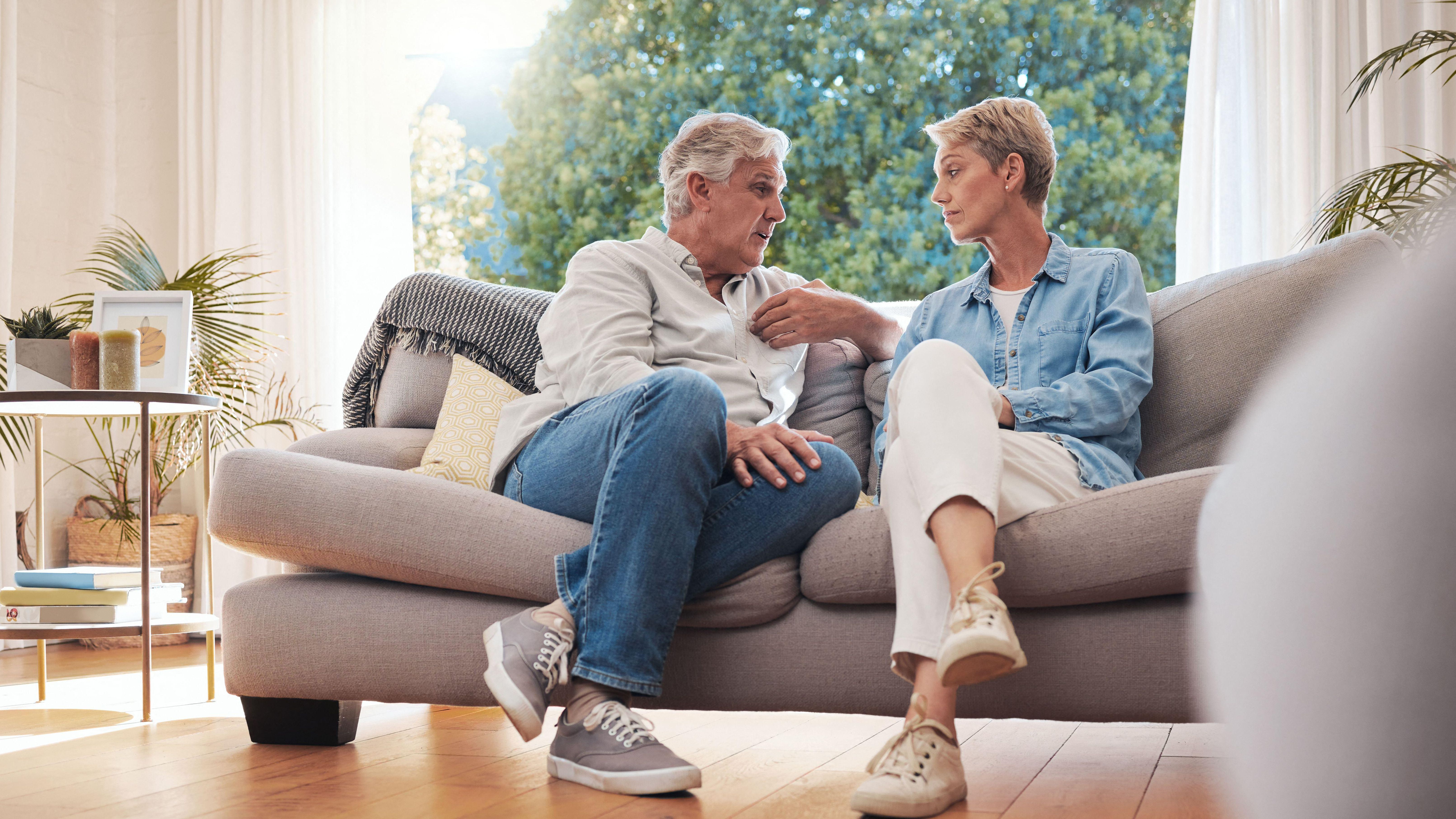 Mature man and woman talking