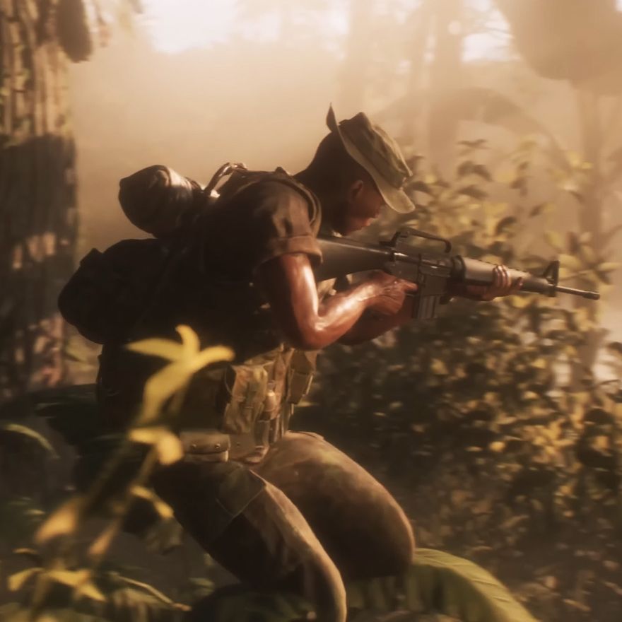 Hell Let Loose: Vietnam - A soldier crouching in the jungle while holding his gun up