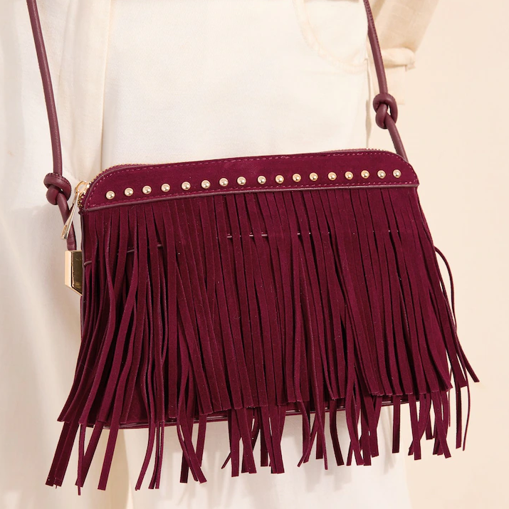 Next, burgundy fringe bag