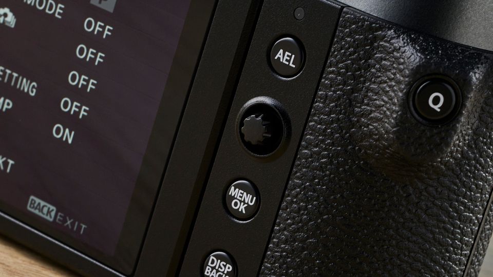 A Fujifilm X-T50 camera in the charcoal grey colorway