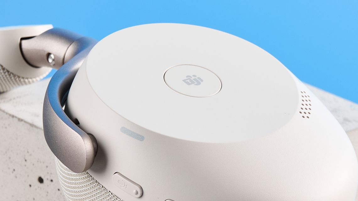 Jabras Evolve3 75 conferencing headset on a stone surface with a blue background