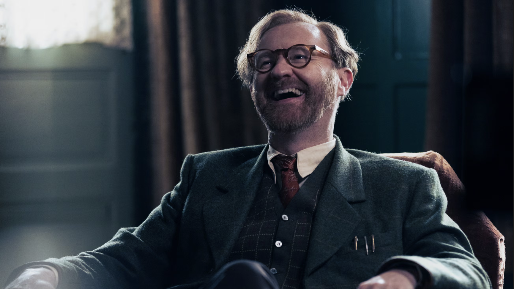 an image of Mark Gatiss in an armchair as Gabriel Book in Bookish