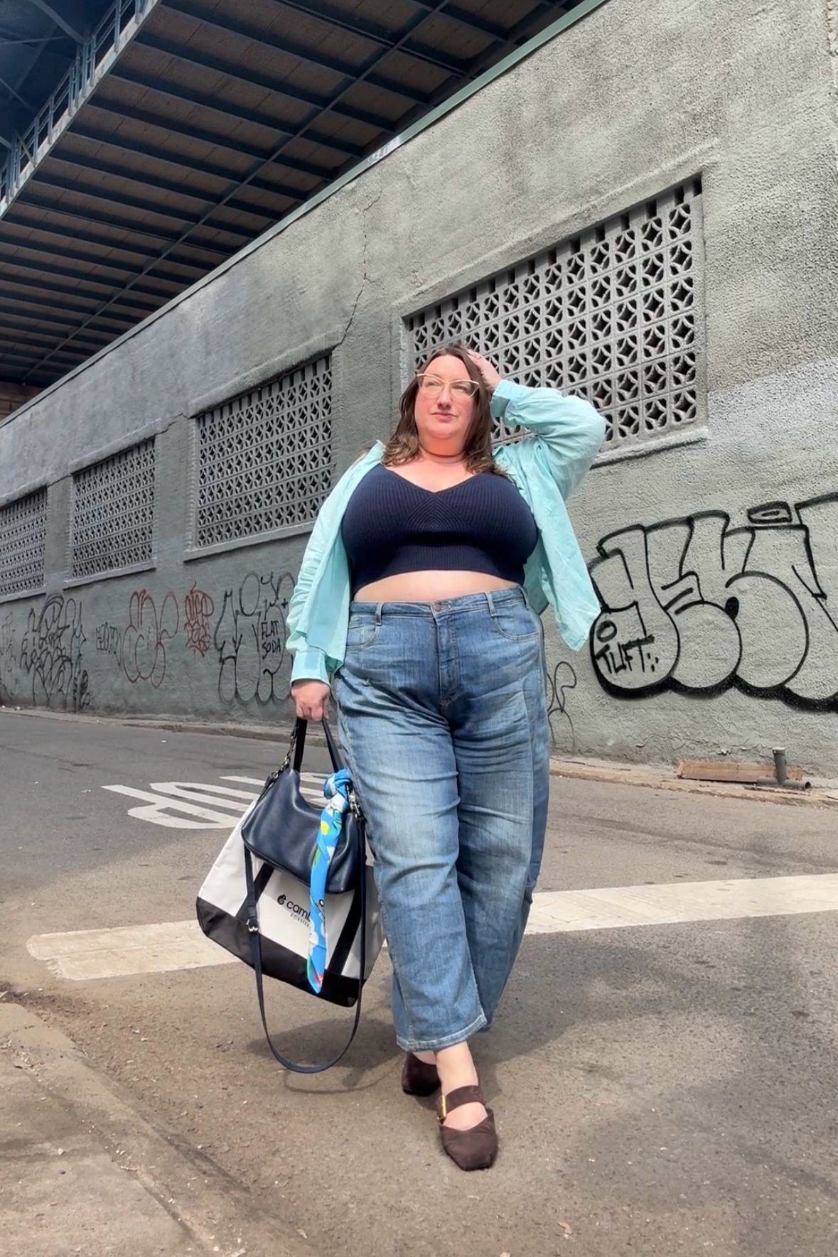 Sarah Chiwaya styles Franco Sarto flats with jeans and a crop top