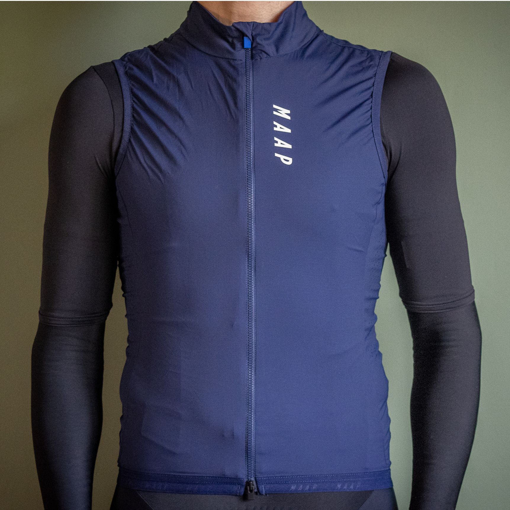 MAAP Draft Team gilet in blue pictured against a plain grey background