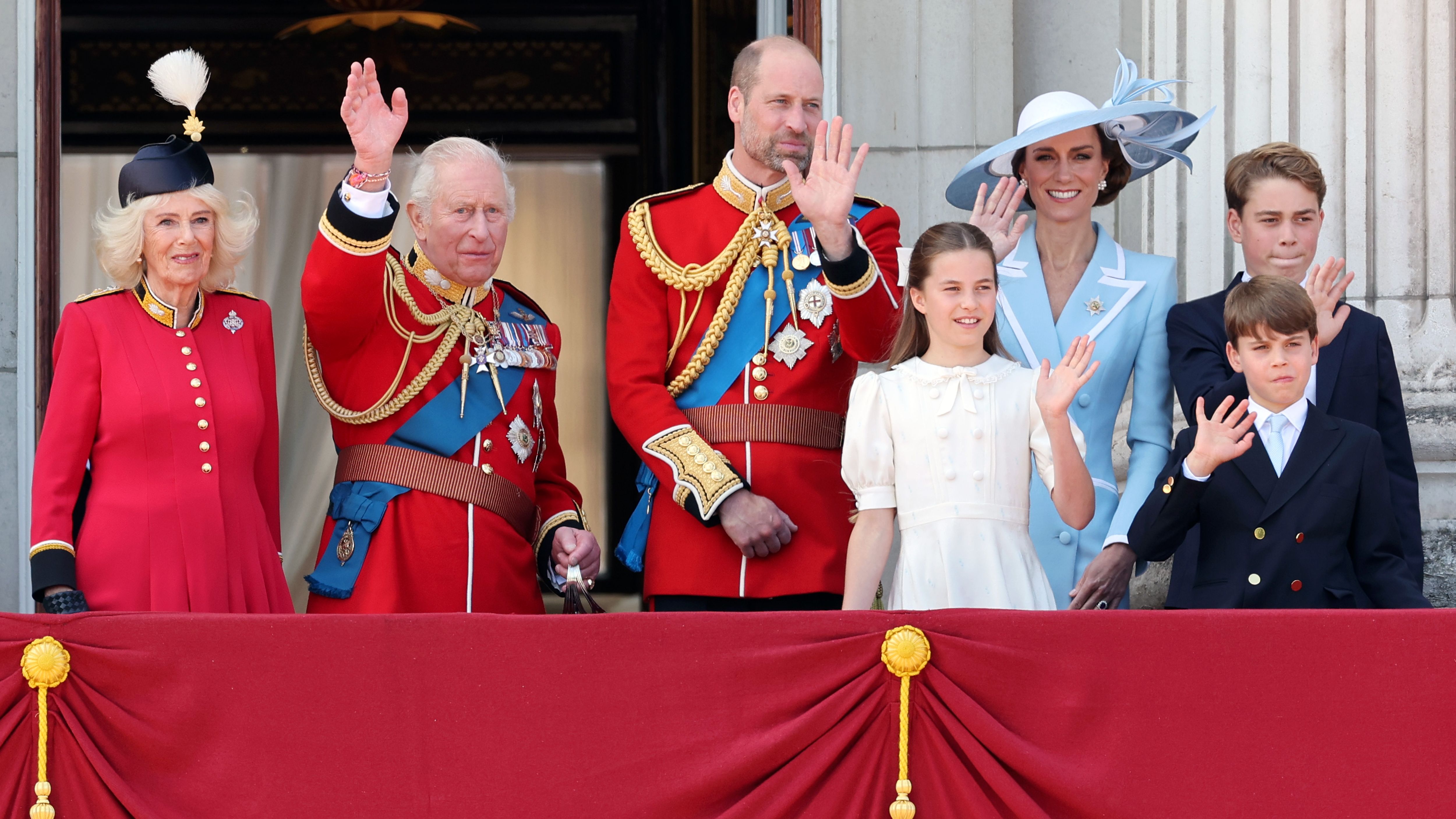 (L-R) Queen Camilla, King Charles III, Prince William, Prince of Wales, Princess Charlotte of Wales, Catherine, Princess of Wales, Prince George of Wales and Prince Louis of Wales watch an RAF flypast from the balcony of Buckingham Palace