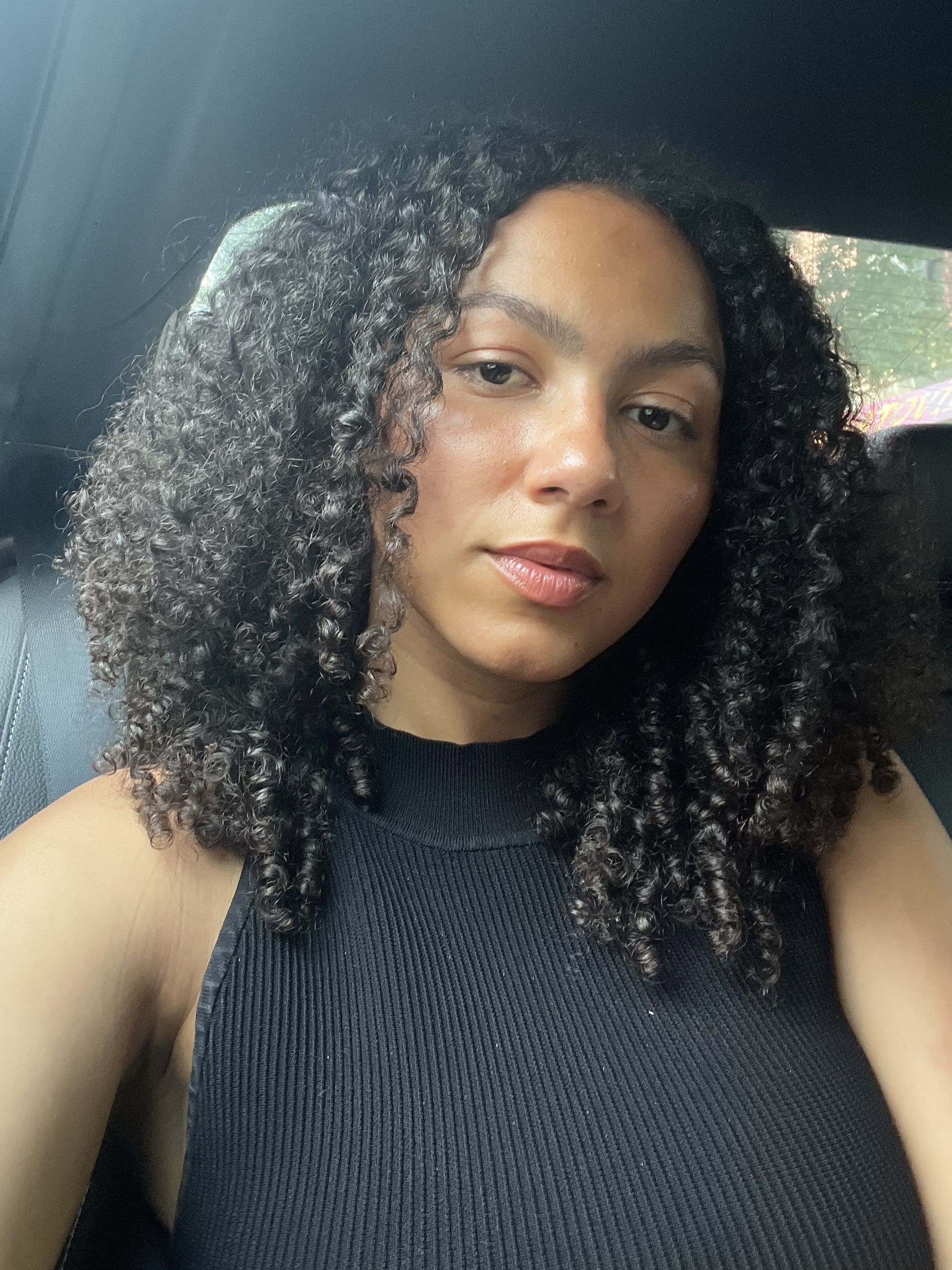 Who What Wear assistant beauty editor Sabrina Talbert wearing the Charlotte Tilbury Airbrush Flawless Foundation.