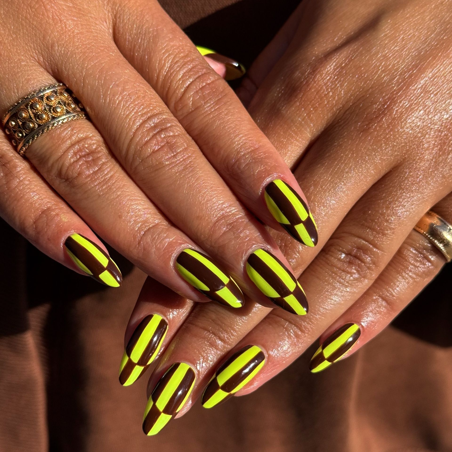 checked lime green and brown manicure