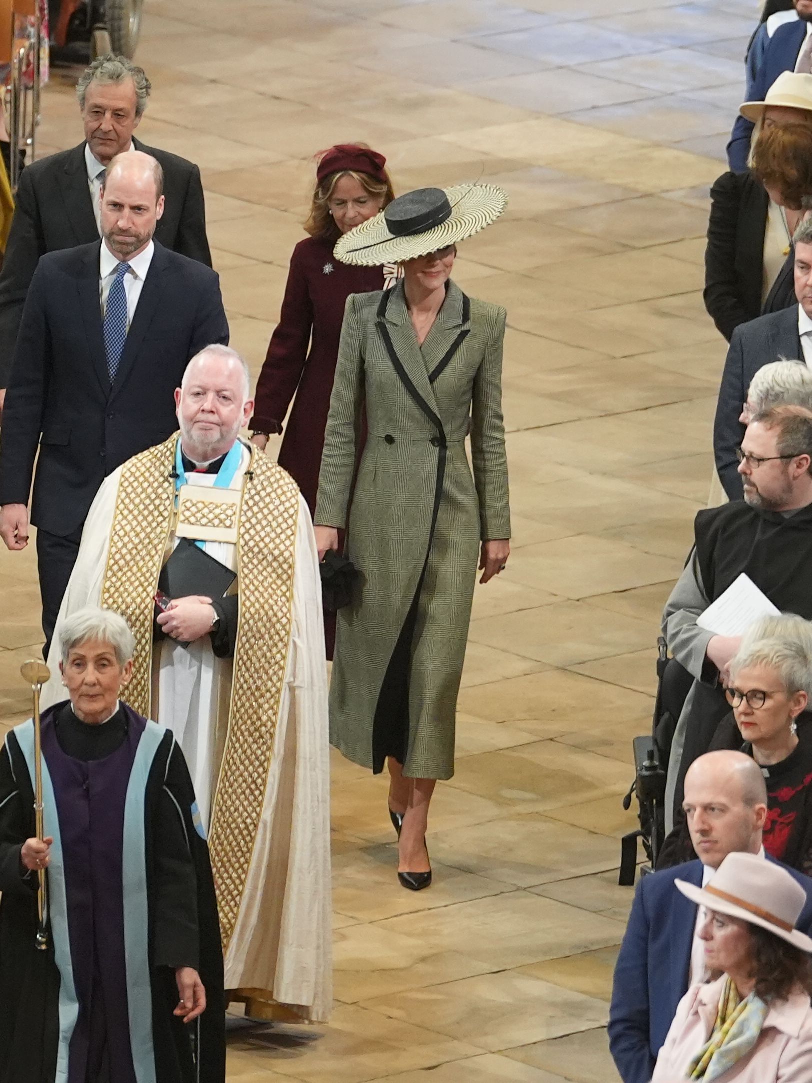 CANTERBURY, ENGLAND - MARCH 25: Dean of Canterbury, the Very Revd Dr David Monteith (C) leads Prince William, Prince of Wales and Catherine, Princess of Wales as they arrive for the Enthronement Ceremony installing Dame Sarah Mullally as the 106th Archbishop of Canterbury at Canterbury Cathedral on March 25, 2026 in Canterbury, United Kingdom. Today Archbishop of Canterbury Sarah Mullally is formally installed as the 106th Archbishop of Canterbury during a service marking the start of her public ministry. Senior members of the British Royal Family, the Prime Minister, and other dignitaries are among more than 2,000 guests in attendance for the installation service, which also includes faith leaders, school children, and healthcare workers. Mullally, who worked as a nurse before becoming ordained, is the first woman to be appointed leader of the Church of England. (Photo by Gareth Fuller - WPA Pool/Getty Images)