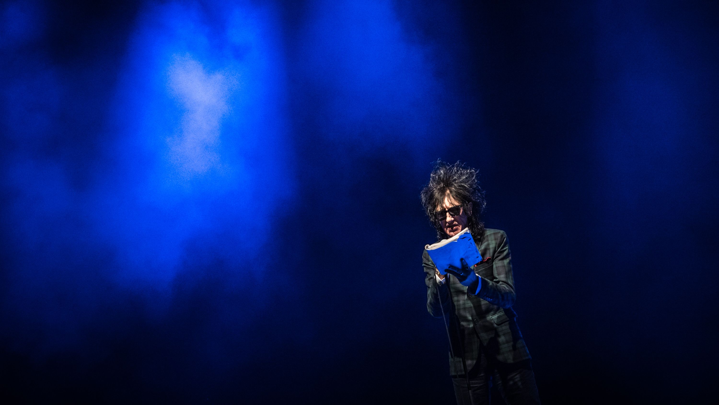 LONDON, UNITED KINGDOM - MARCH 07: John Cooper Clarke performs at Shepherds Bush Empire on March 7, 2014 in London, England. (Photo by Ollie Millington/WireImage)