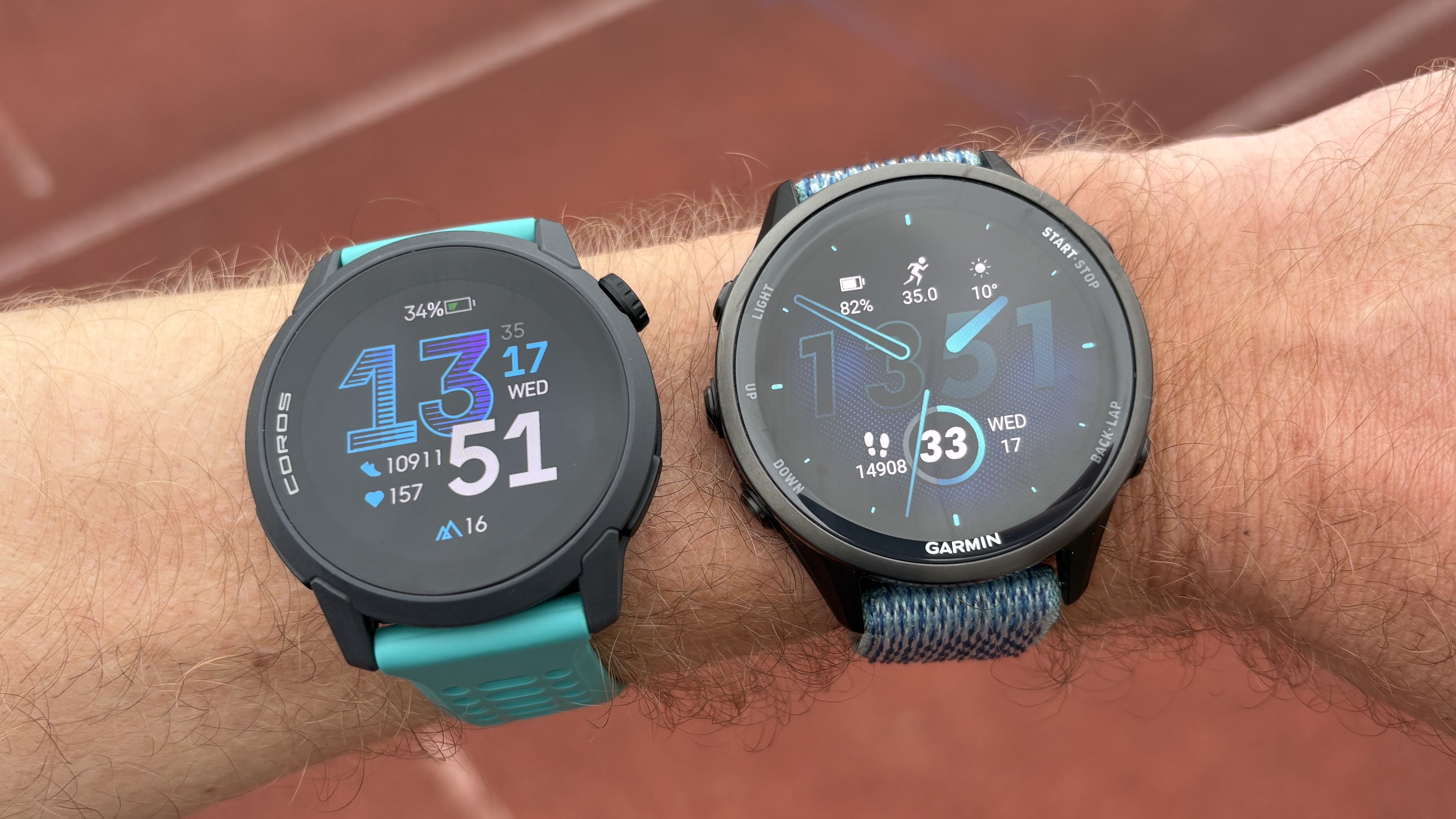 Coros Pace 4 and Garmin Forerunner 970 on a man's wrist