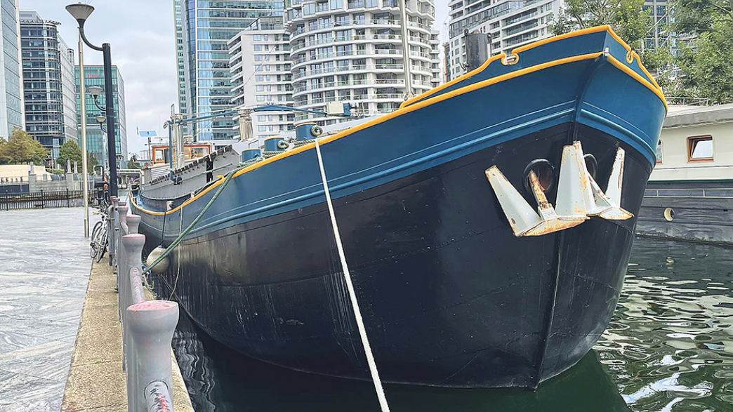 an image of the exterior of the boat moored in Millwall Cutting in Canary Wharf