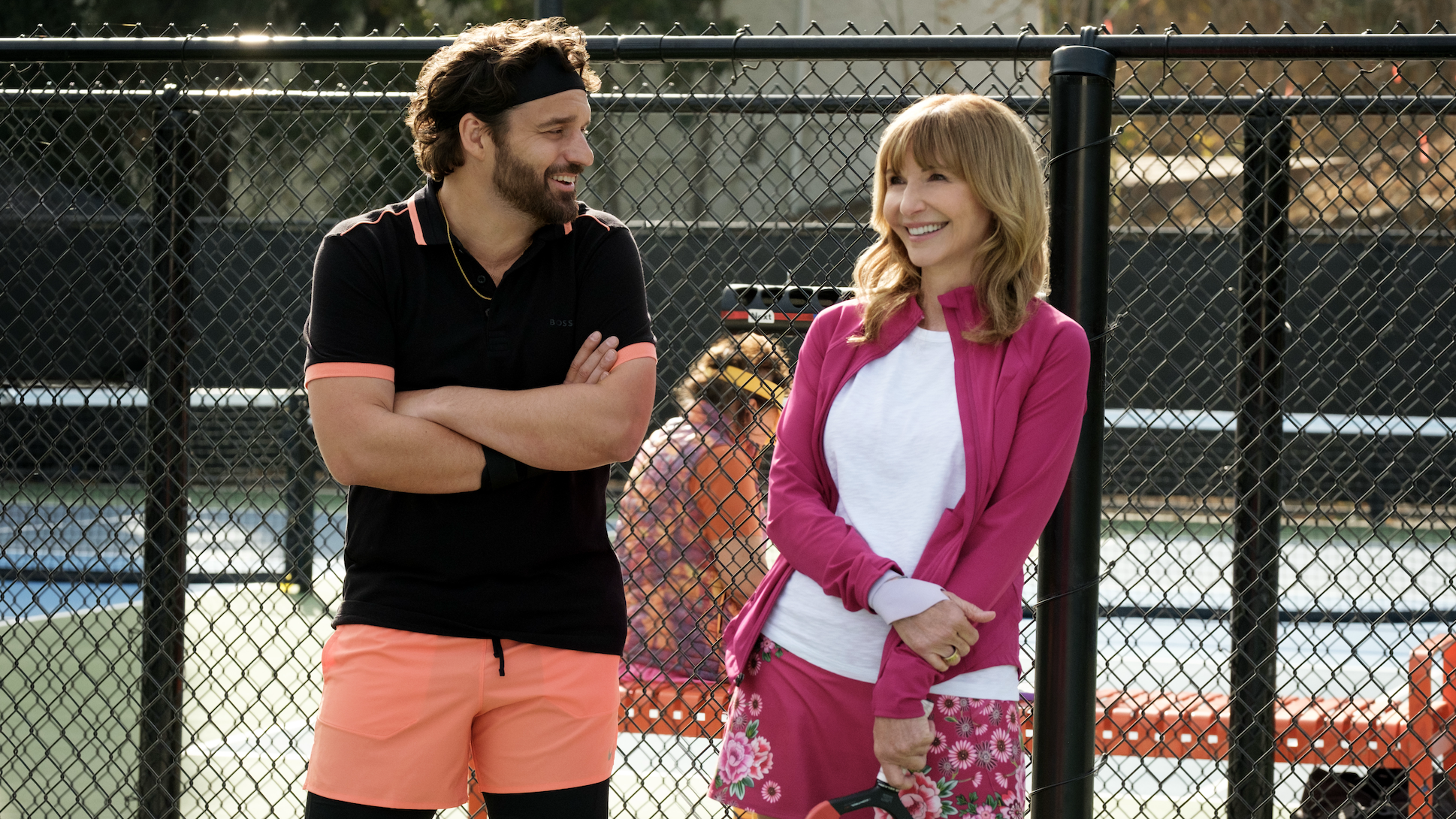 an image of Jake Johnson as Dusty and Mary Steenburgen as Candice in The Dink at a Pickleball court