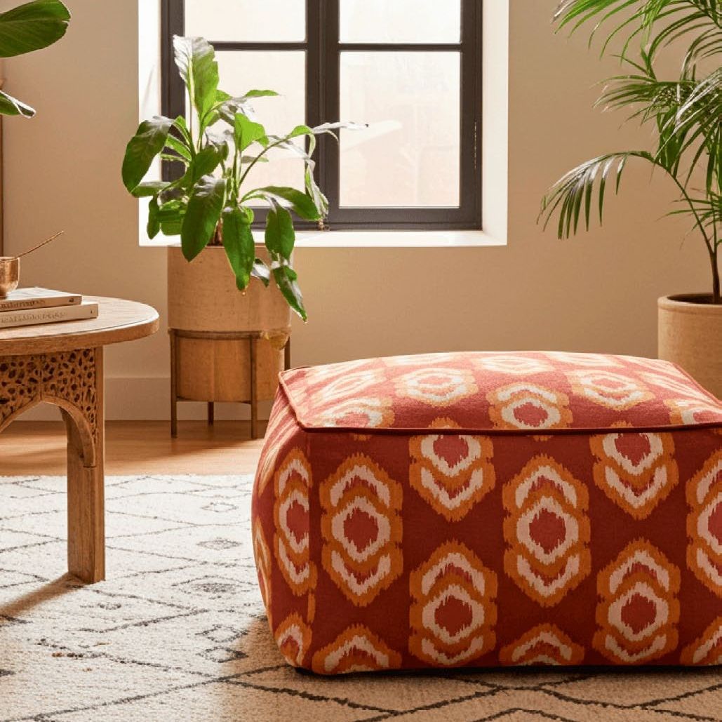 Beige room with IKAT velvet floor cushion and berber style rug