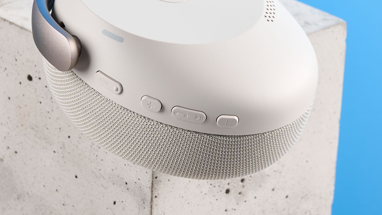 Jabras Evolve3 75 conferencing headset on a stone surface with a blue background