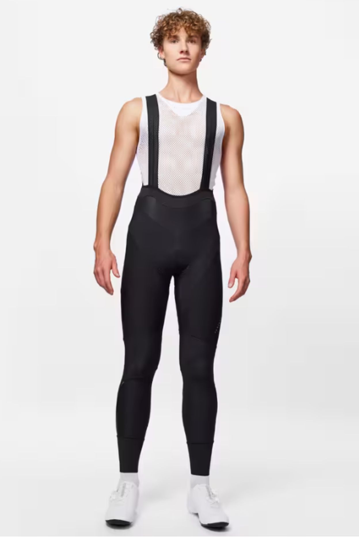 A cyclist wearing a pair of Van Rysel RCR bibtights