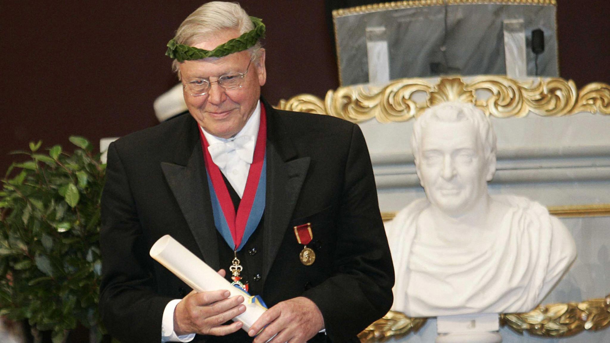 Uppsala, SWEDEN: British documentary filmmaker David Attenborough receives an honorary doctorate at the Faculty of Education of Uppsala University north of Stockholm, 26 May 2007. Fourteen honorary doctorates were handed in the memory of Swedish botanist Carl von Linne today. To celebrate the tricentenary of Linnaeus&amp;amp;apos; birth on May 23, 1707, festivities, exhibits, conferences and floral events will be organised in Sweden and around the world this week. In his groundbreaking book Systema Naturae, published in 1735, Linnaeus, also known as Carl von Linne, the name he was given after he was knighted by the Swedish king in 1757, classified the animal, plant and mineral worlds, defining each species by a double name in Latin. AFP PHOTO/JONAS EKSTROMER/SCANPIX ** SWEDEN OUT ** (Photo credit should read JONAS EKSTOMER/AFP via Getty Images)