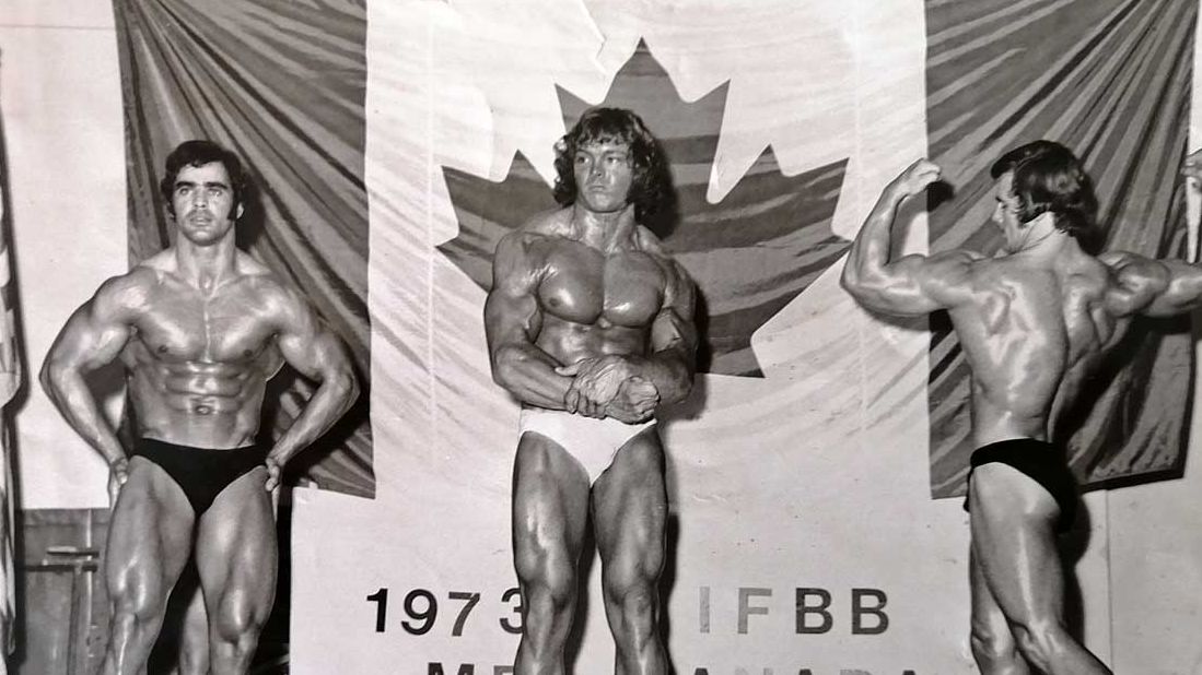 Thor on the podium at the Mr Canada competition in 1973