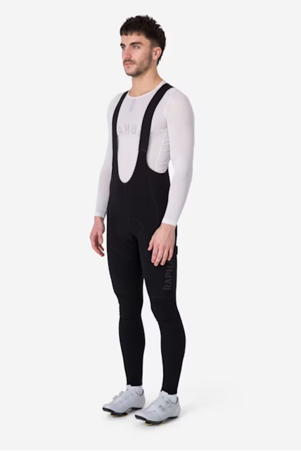 A cyclist wearing a pair of Rapha Pro Team winter tights
