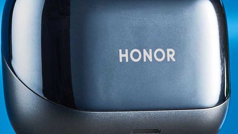 A pair of black Honor Earbuds 4 wireless earbuds