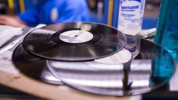A stack of records at an EvoVinyl pressing plant.