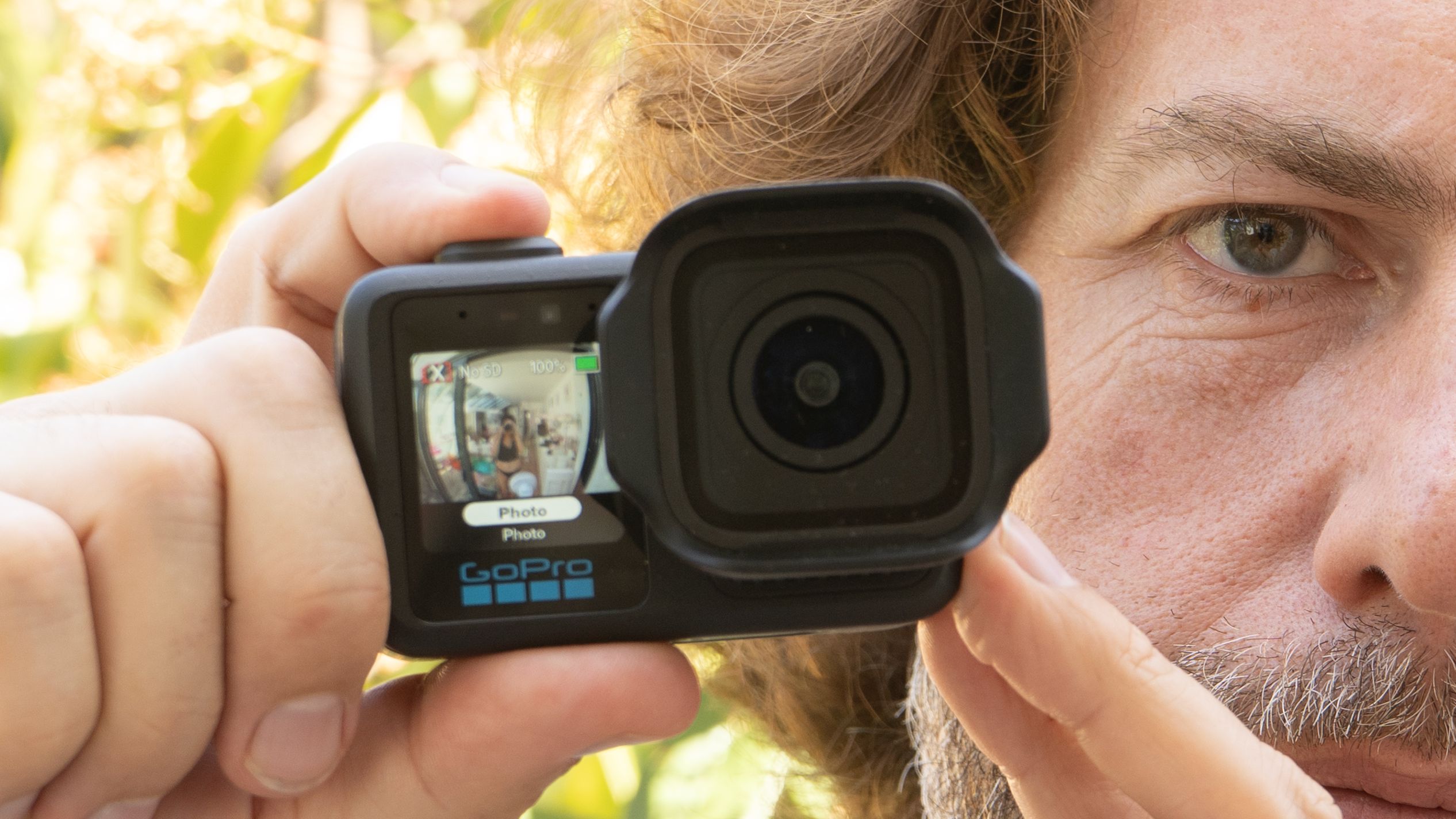 Adam Juniper holding a GoPro Mission 1 Pro camera