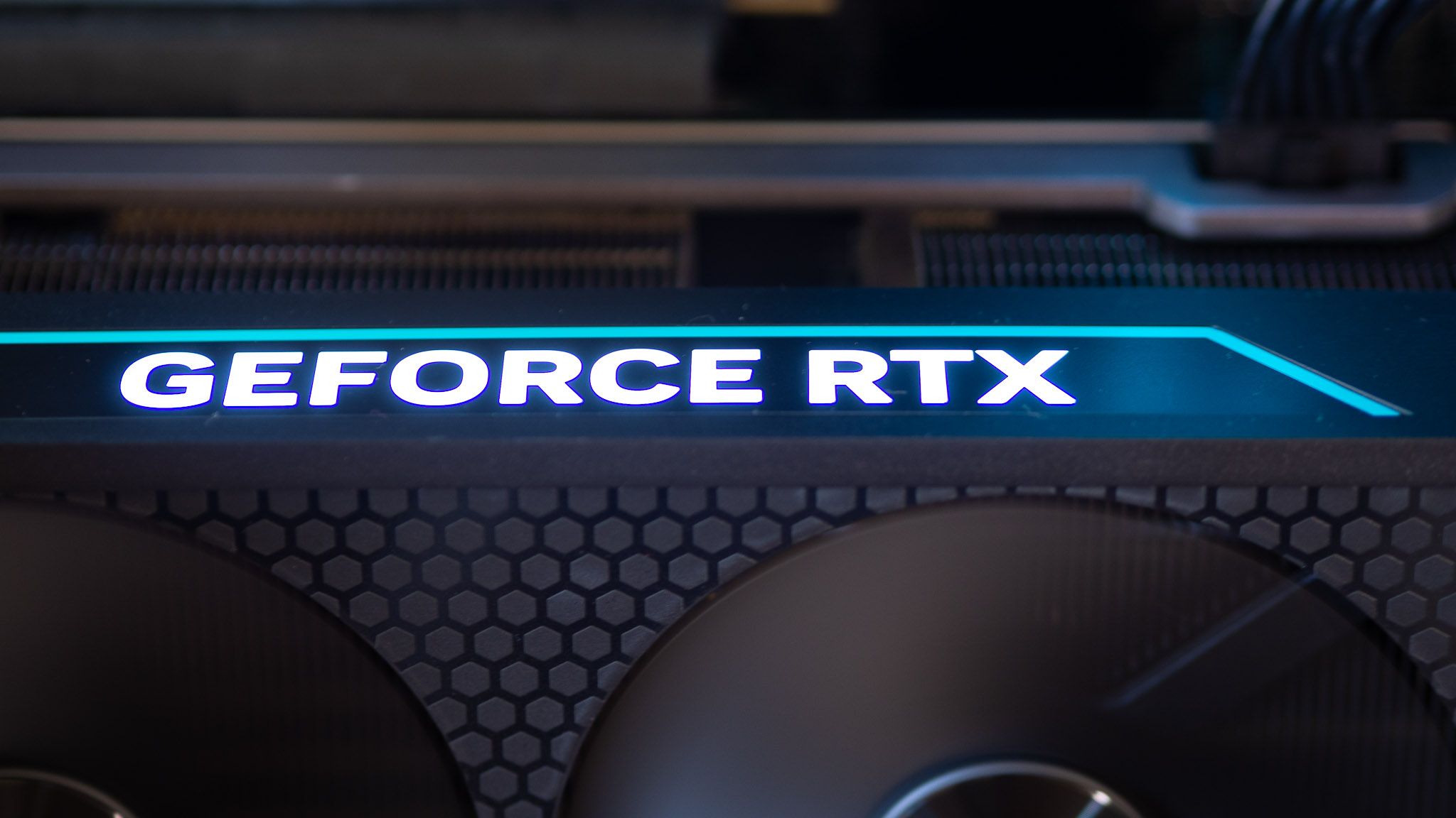 Acer Predator Orion 7000 gaming desktop PC on a wooden desk and yellow background