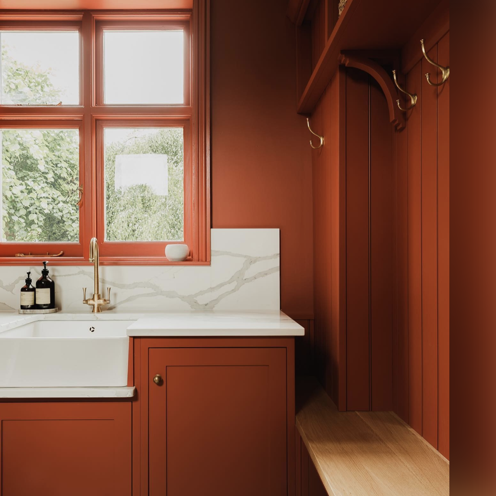 Kitchen painted in rust red color