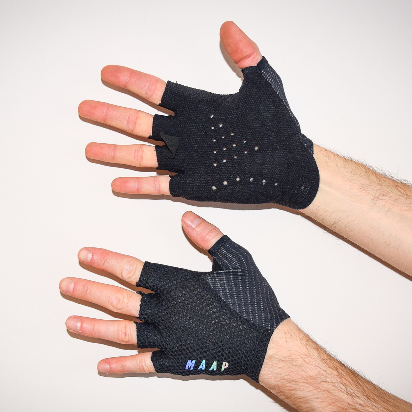 MAAP Pro Race mitts being worn against a white background