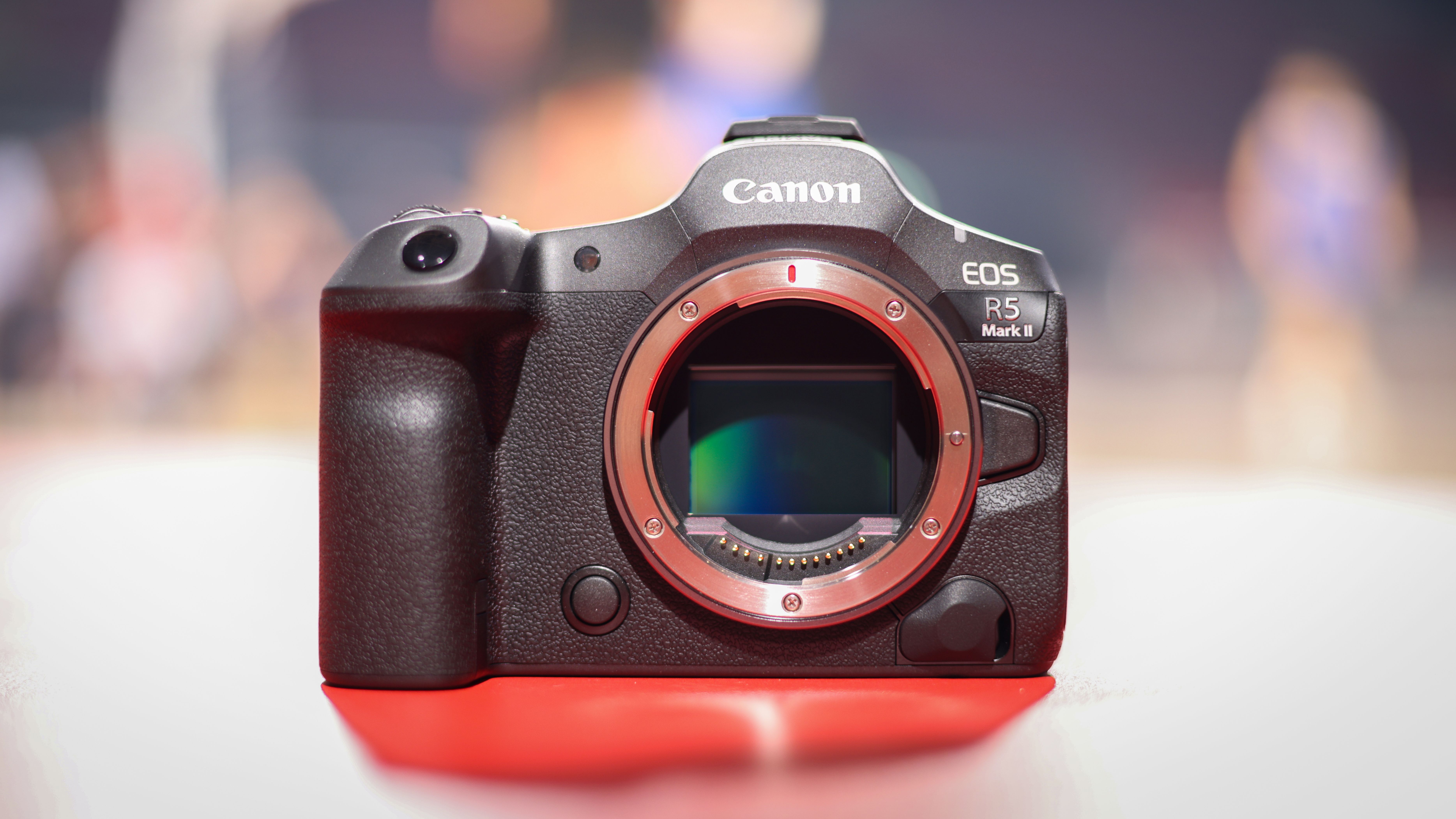 Canon EOS R5 Mark II on the court in front of a basketball game