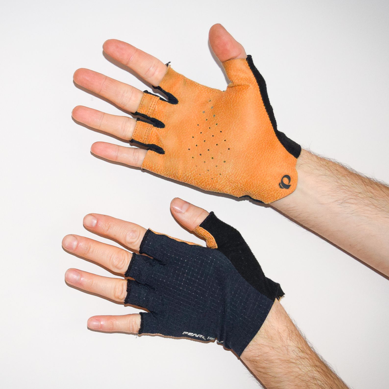 Pearl Izumi Pro Air Mitts being worn against a white background