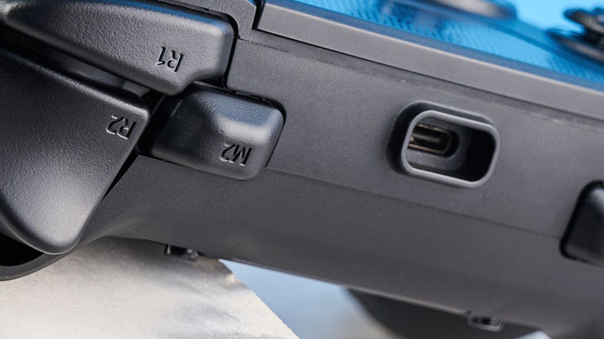 A black Razer Raiju V3 Pro controller for PS5